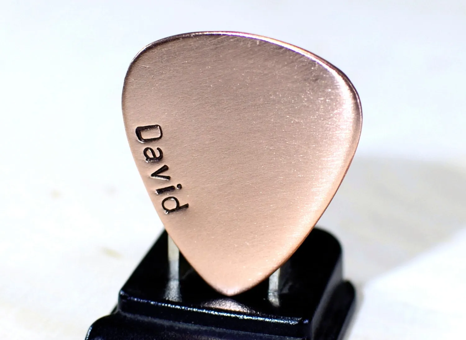 Copper guitar pick with personalized name