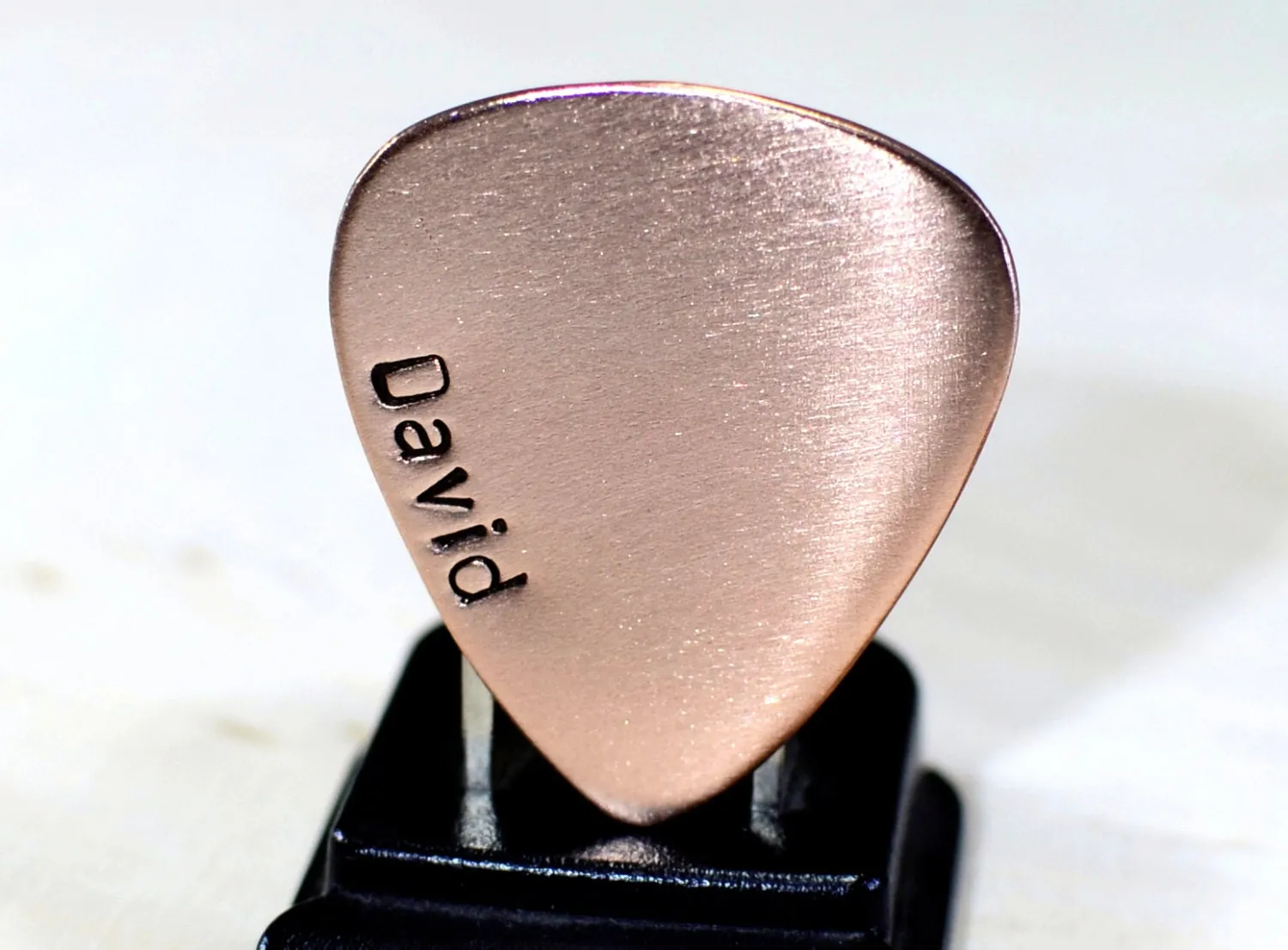 Copper guitar pick with personalized name