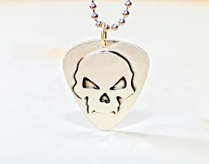 Skull design on sterling silver guitar pick for a bad ass guitarist
